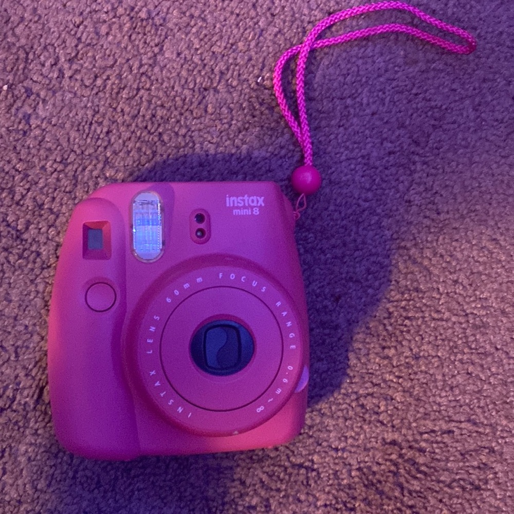Pink Polaroid camera instax mini 8